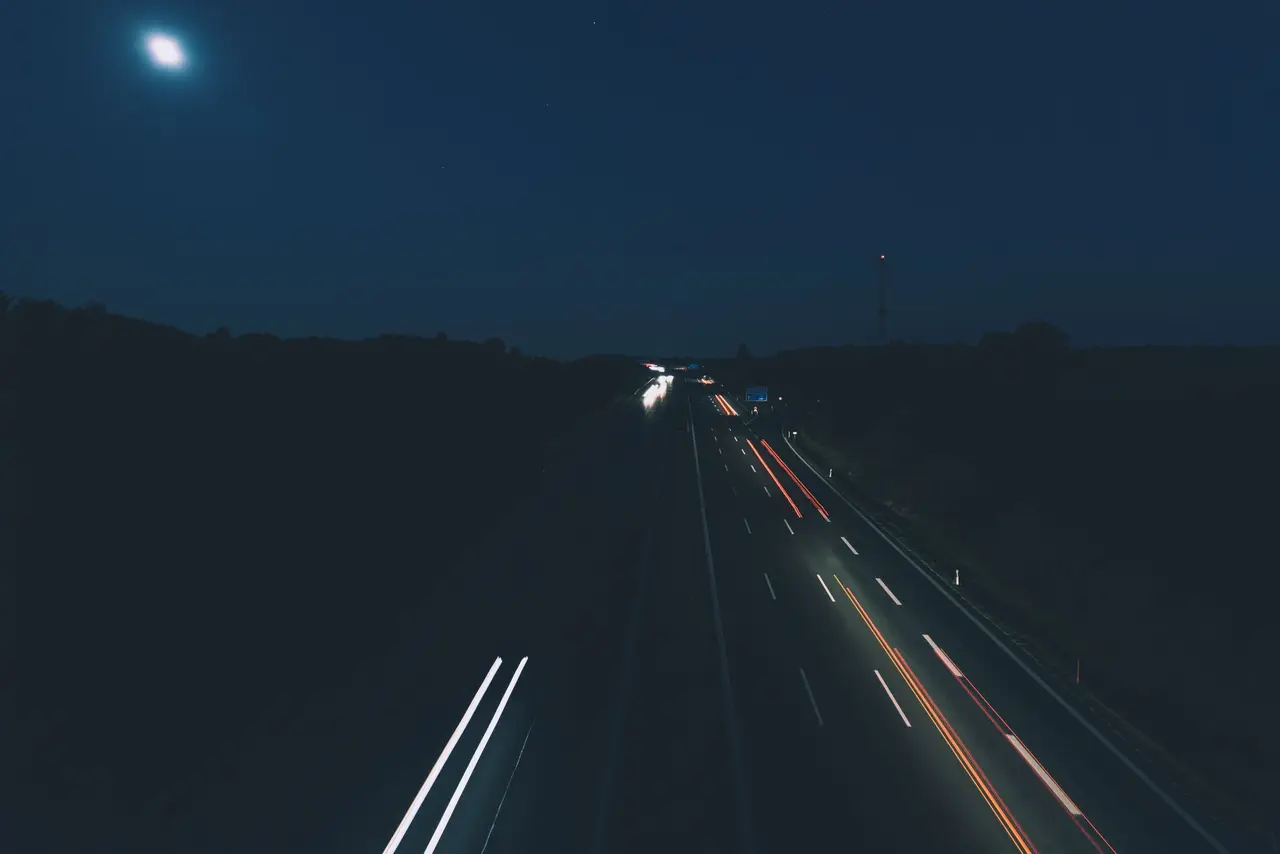 Motorway at night with light trails
